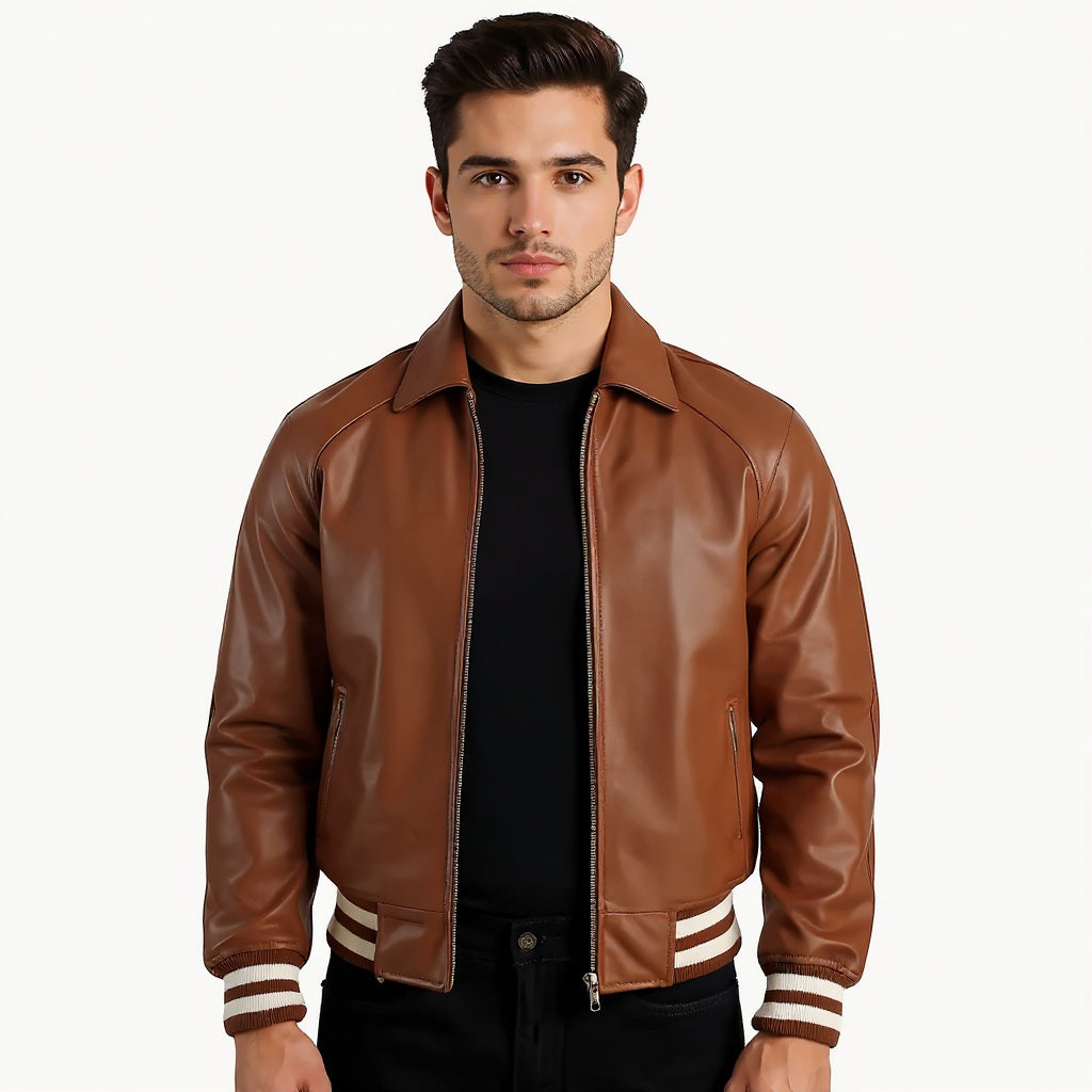 Man wearing a brown leather jacket with white trim on a white background