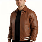 Brown leather jacket with white stripes on sleeves worn by a person on a white background