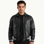 Man wearing a black leather jacket with white stripes on the sleeves against a white background