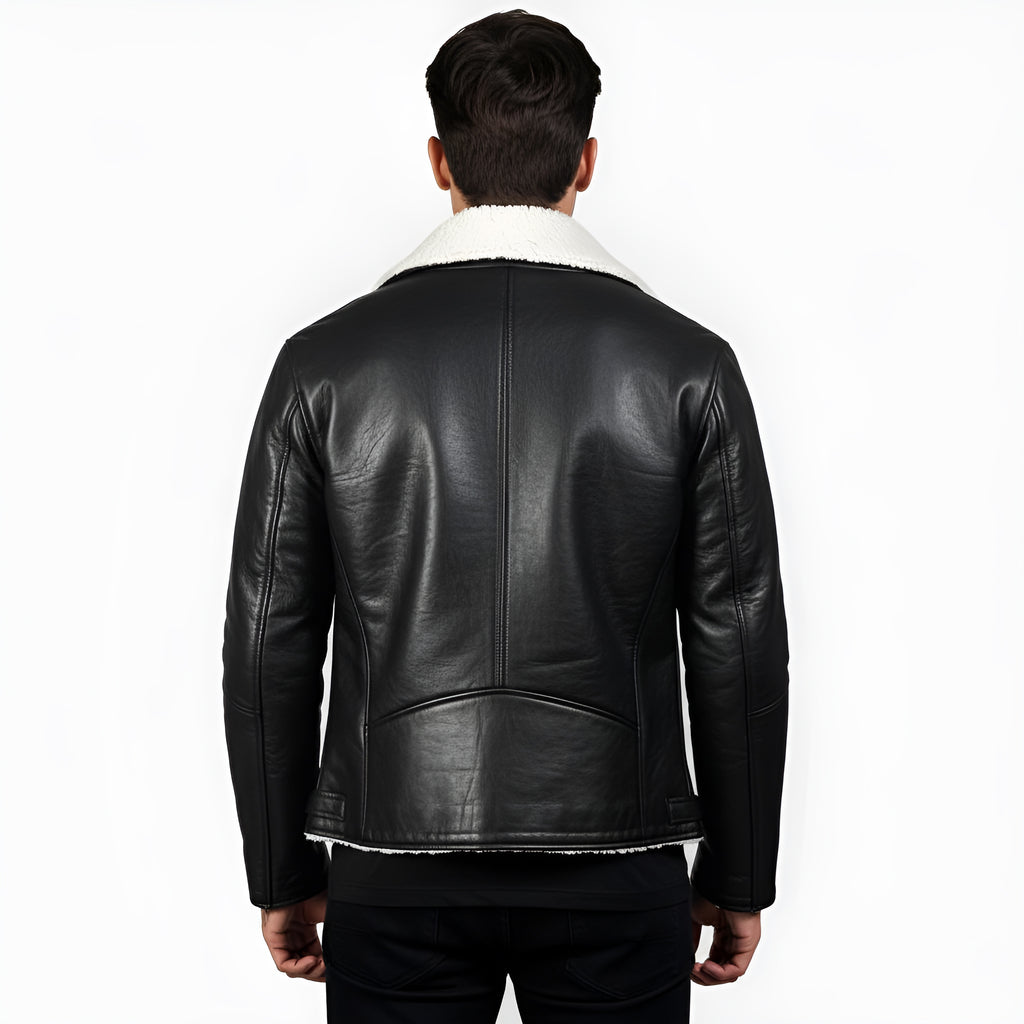 Black leather jacket with white lining worn by a person on a white background