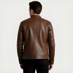Man wearing a brown leather jacket on a white background