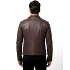 Brown leather jacket worn by a person on a white background