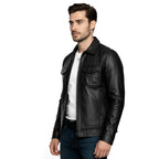 Man wearing a black leather jacket on a white background