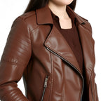 Brown leather jacket worn by a person on a white background