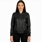 Woman wearing a black leather jacket on a white background