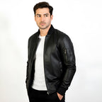 Man wearing a black leather jacket on a white background