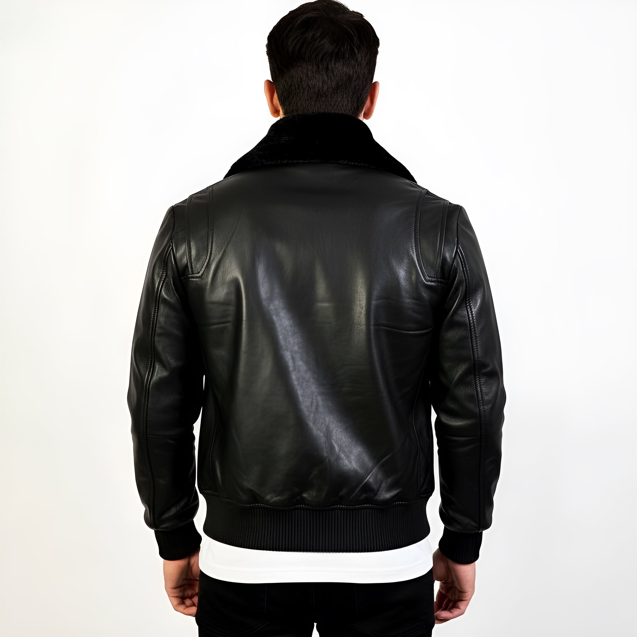 Person wearing a black leather jacket on a white background