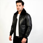 Man wearing a black leather jacket on a white background