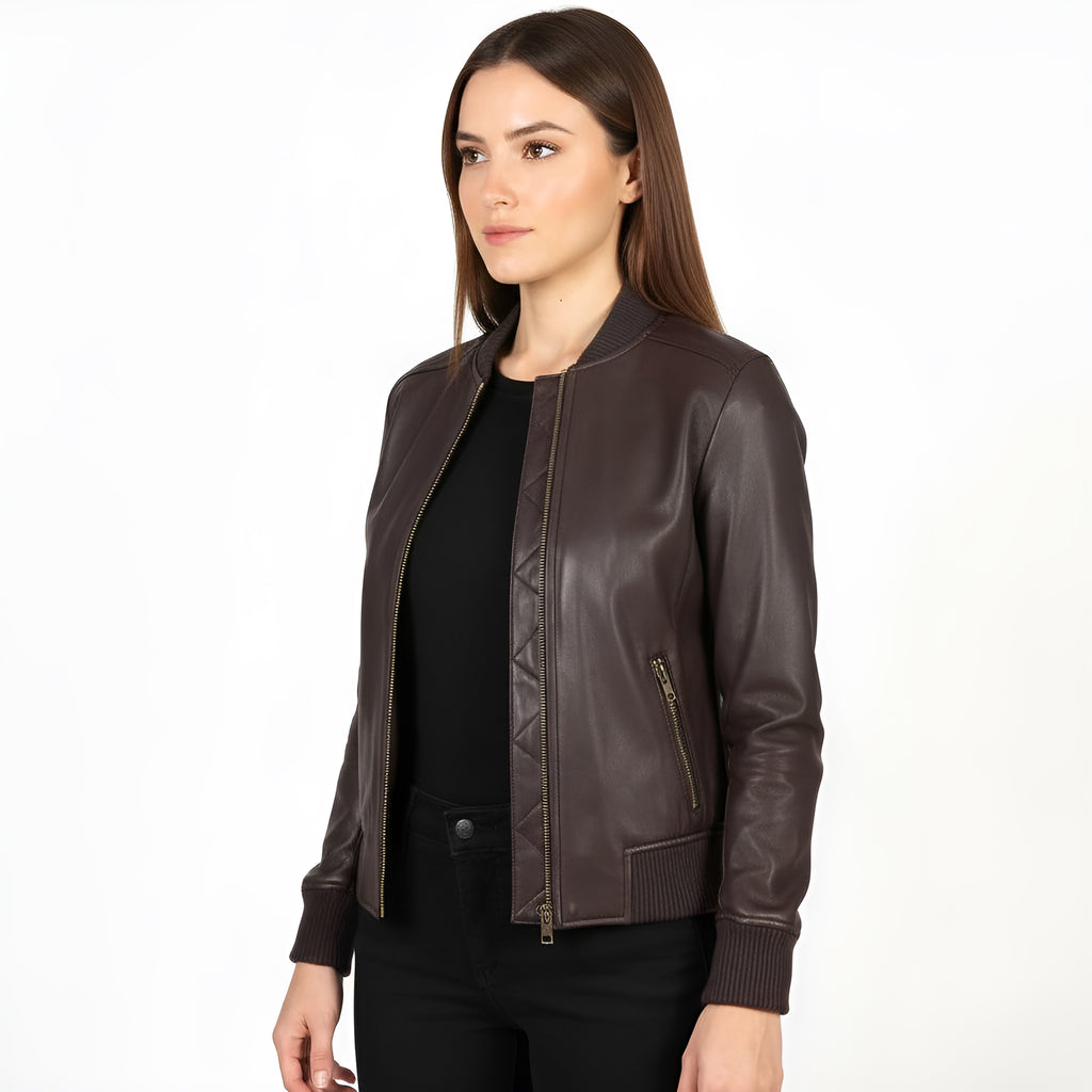 Woman wearing a brown leather jacket on a white background