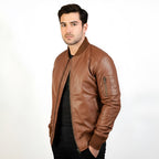 Man wearing a brown leather jacket on a white background
