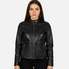 Woman wearing a black leather jacket on a white background
