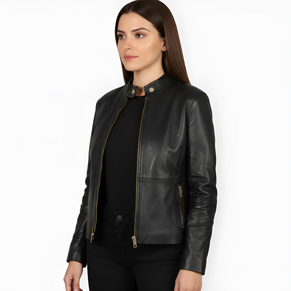 Woman wearing a black leather jacket on a white background