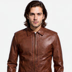 Man wearing a brown leather jacket on a white background