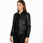 Woman wearing a black leather jacket on a white background