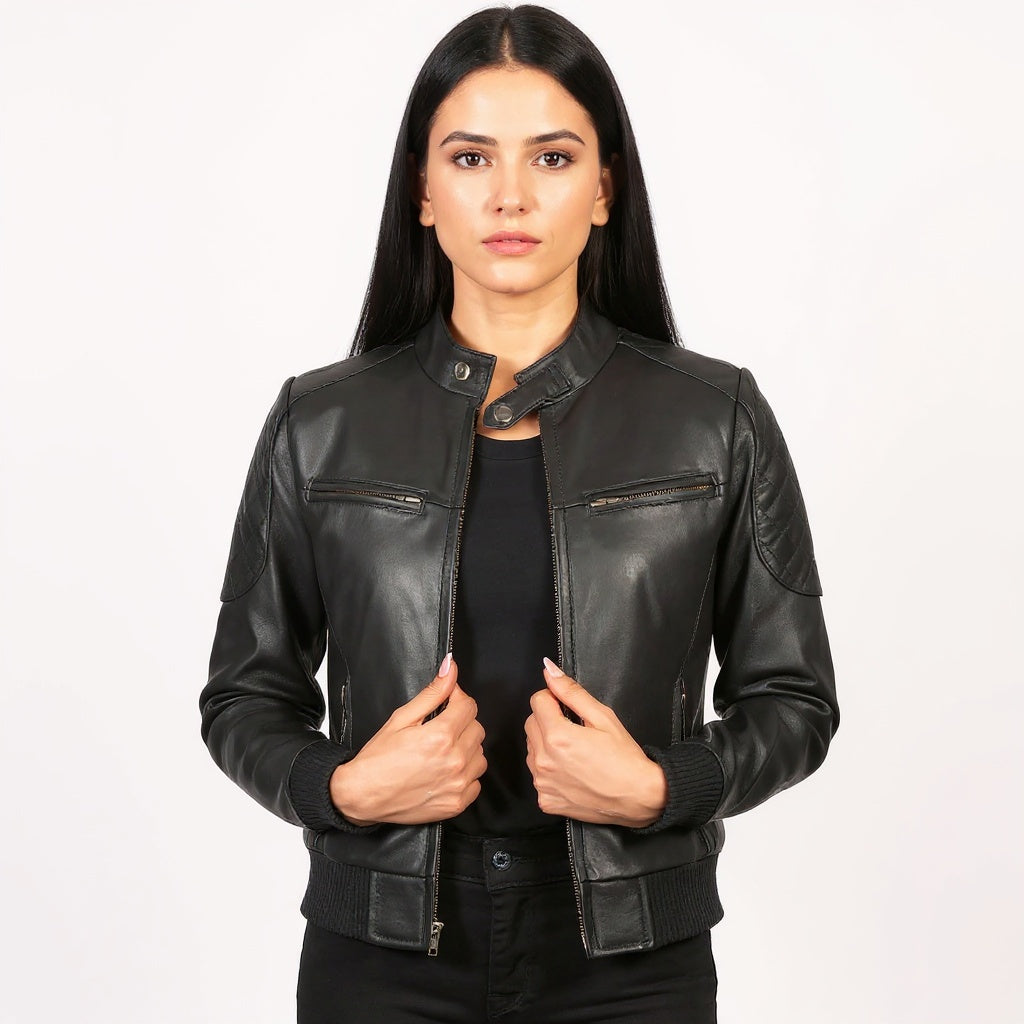Woman wearing a black leather jacket on a white background