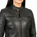 Black leather jacket with quilted shoulder design on a white background