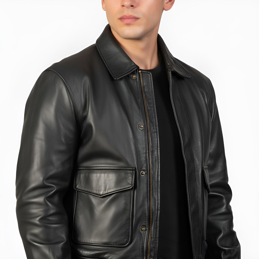 Black leather jacket worn by a person on a white background