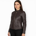 Woman wearing a brown leather jacket on a white background