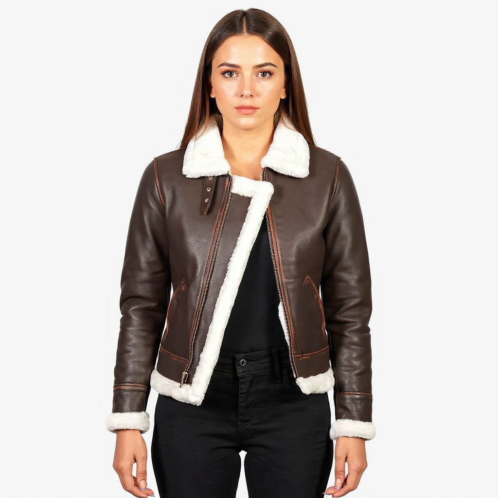 Woman wearing a brown leather jacket with white fur trim on a white background