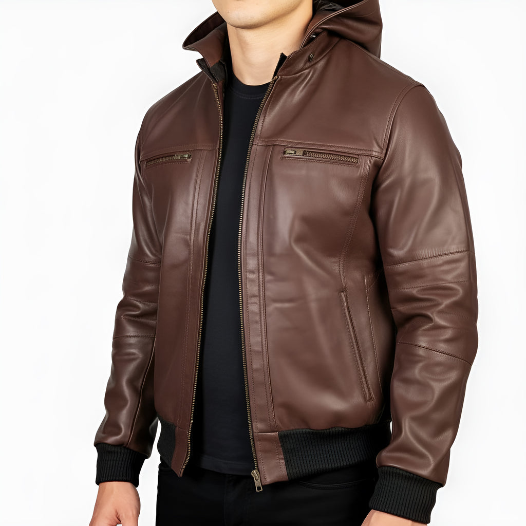 Brown leather jacket worn by a person on a white background