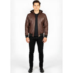 Man wearing a brown leather jacket on a white background