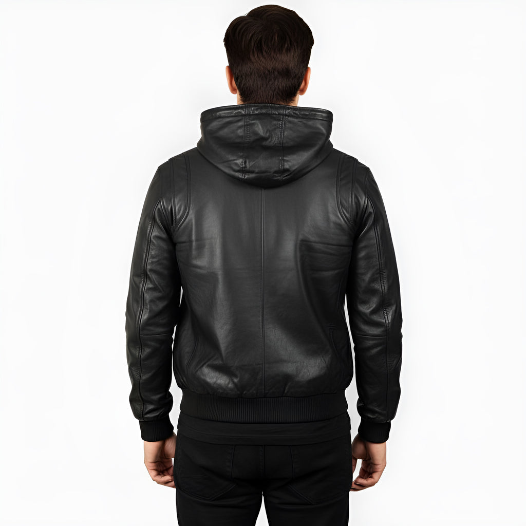 Person wearing a black leather jacket on a white background