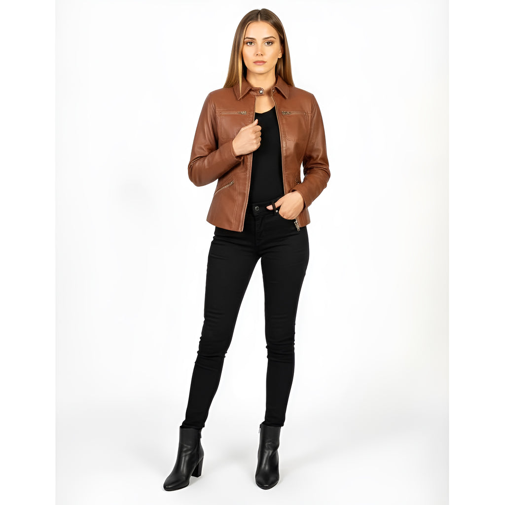 Woman wearing a brown leather jacket and black pants on a white background