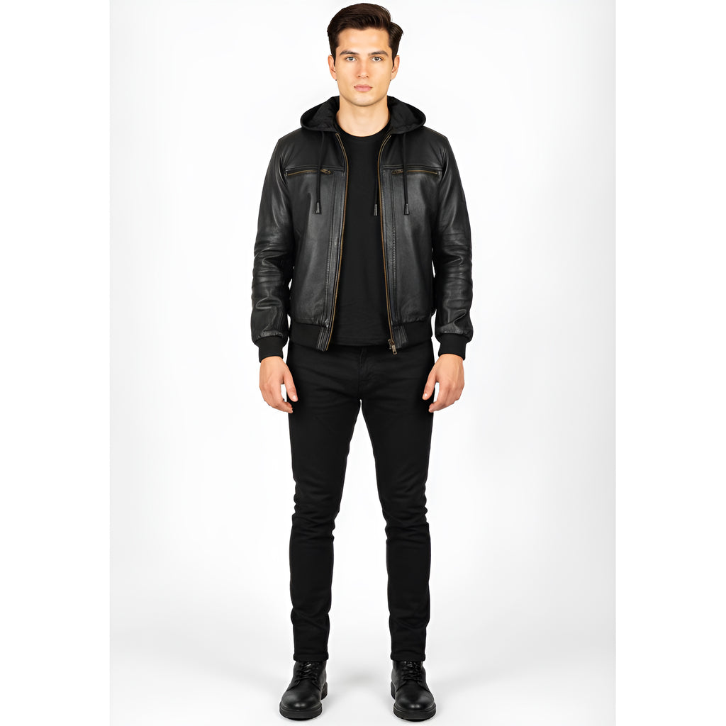 Man wearing a black leather jacket, black shirt, and black pants on a white background