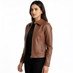 Woman wearing a brown leather jacket on a white background